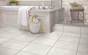 Bathroom with sandy-white flooring