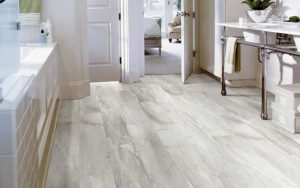 Bathroom with muted plank-style resilient flooring